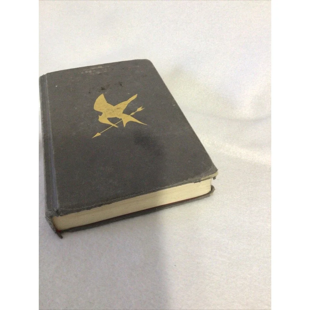 Scholastic The Hunger Games Suzanne Collins First Edition Hardcover‎ Grey Good